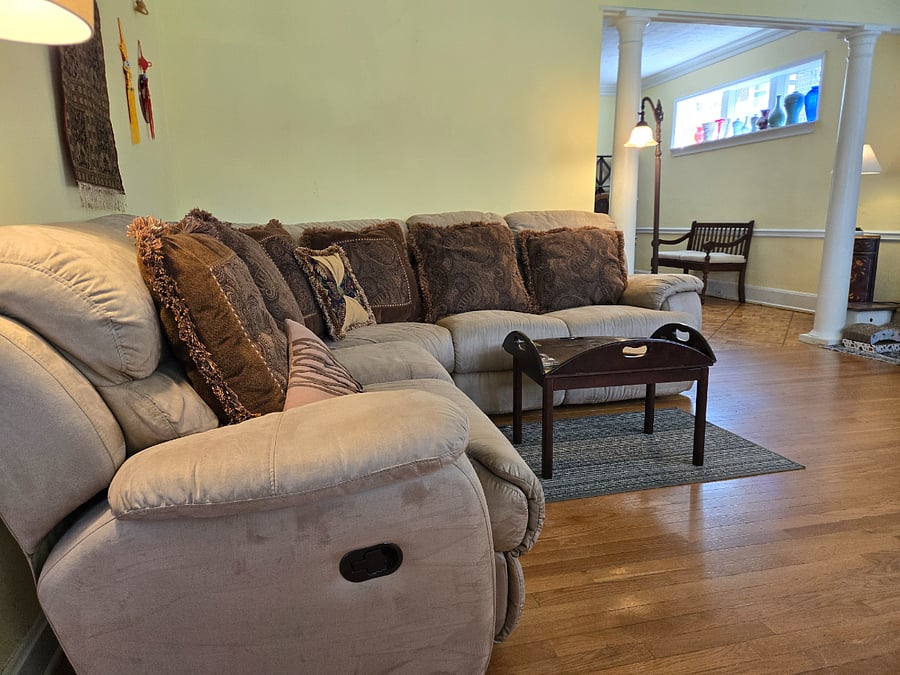 Comfy sectional couch in living room.