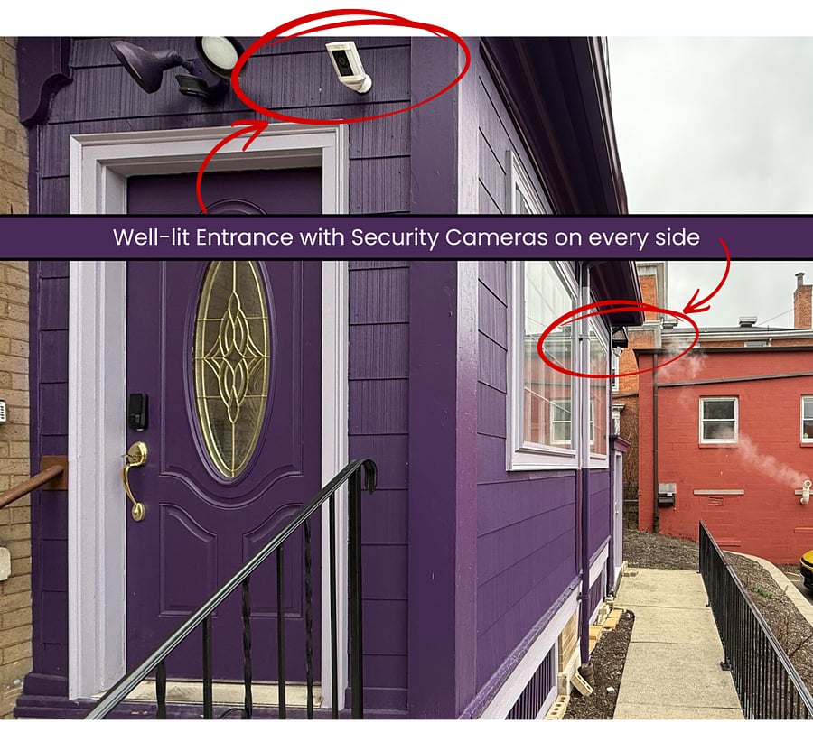 Well-lit back entrance monitored by security cameras.