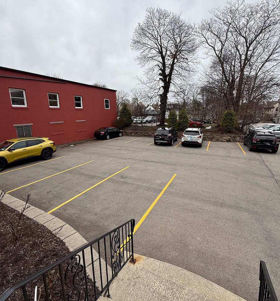 11 Car stall, well lit, camera monitored parking lot behind the building. Apartment comes with 2 guaranteed overnight spots.
