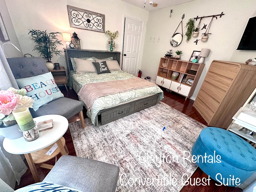 Bedroom #4 is a convertible queen bedroom suite or work space. It features plenty of storage and a convertible Queen-size Murphy Bed.