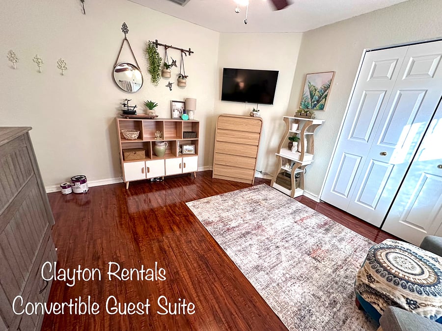 Bedroom #4 is a convertible queen bedroom suite or work space. It features plenty of storage and a convertible Queen-size Murphy Bed.