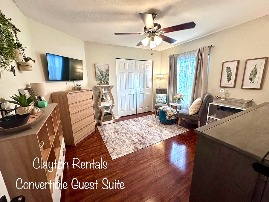 Bedroom #4 is a convertible queen bedroom suite or work space. It features plenty of storage and a convertible Queen-size Murphy Bed.