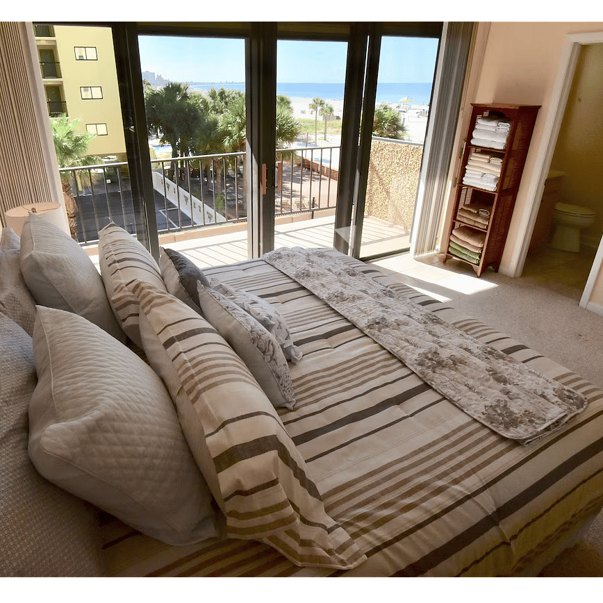 large second bedroom with private lanai and southwest view of the beach and ocean.