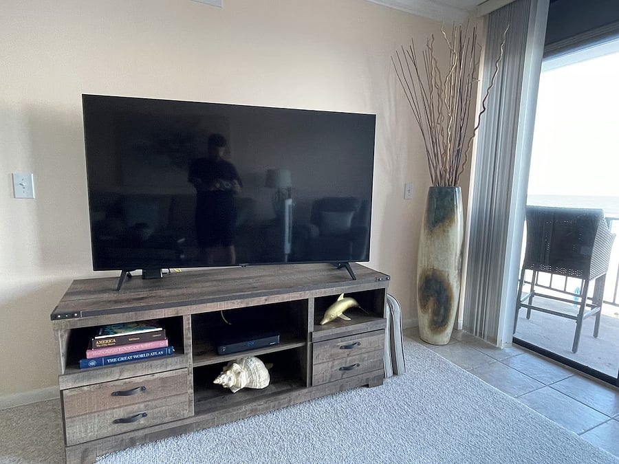 New 65" HD TV, with cable and streaming services.