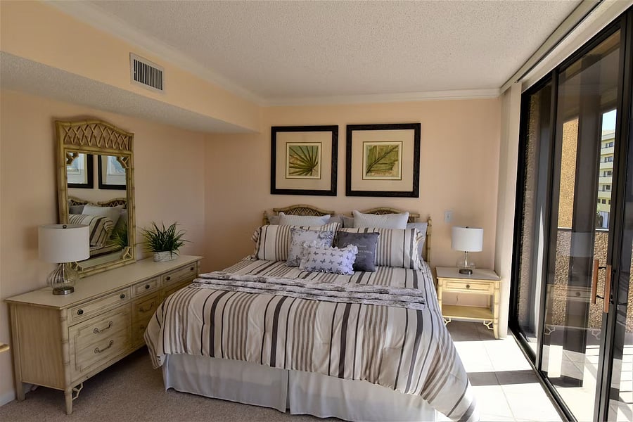 Second bedroom has a large, walk-in closet, full size en suite bathroom with shower and jetted tub