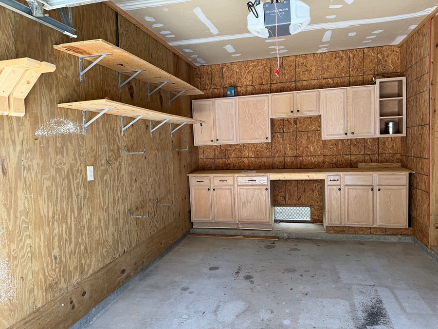 Garage interior lots of storage space or room for compact car