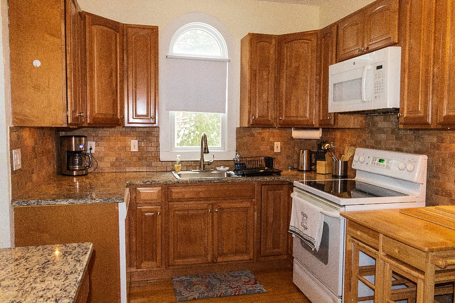 Spacious, fully equipped kitchen with plenty of storageperfect for cooking, entertaining, and enjoying meals with family or friends.