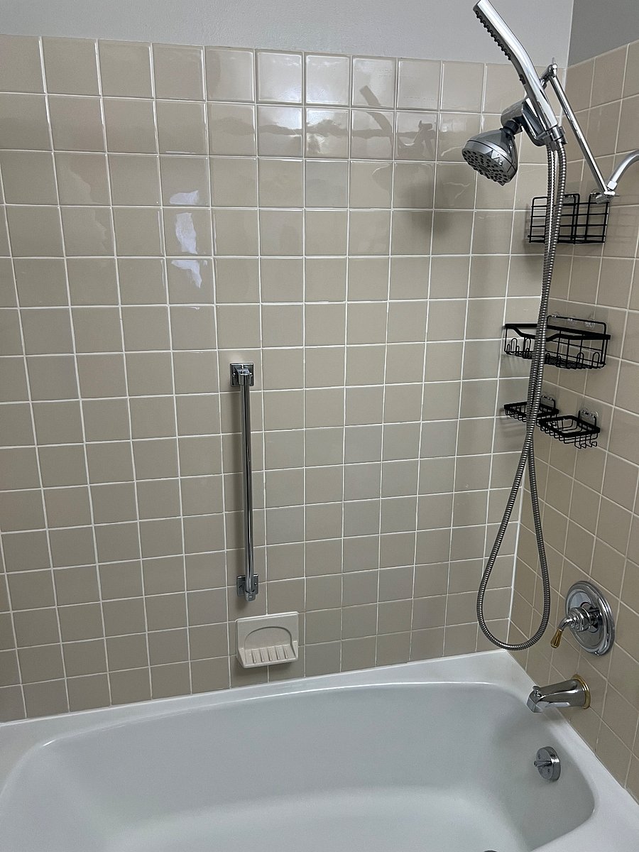Full size shower and tub.