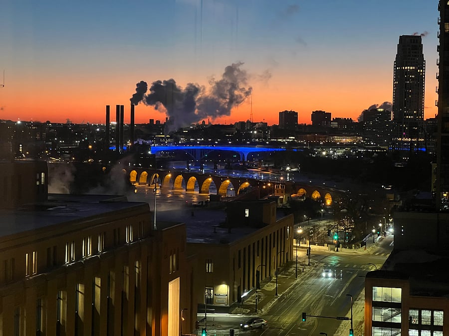 Sunrise view from dining room with cozy electric fireplace.