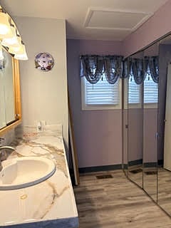 2nd Bathroom with large walk in shower, washer, dryer and large linen closet.