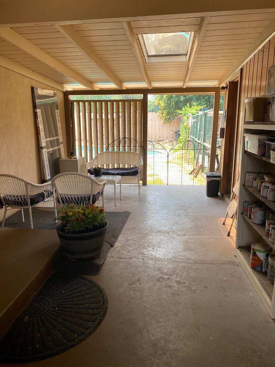 Covered entrance that leads to the backyard and pool