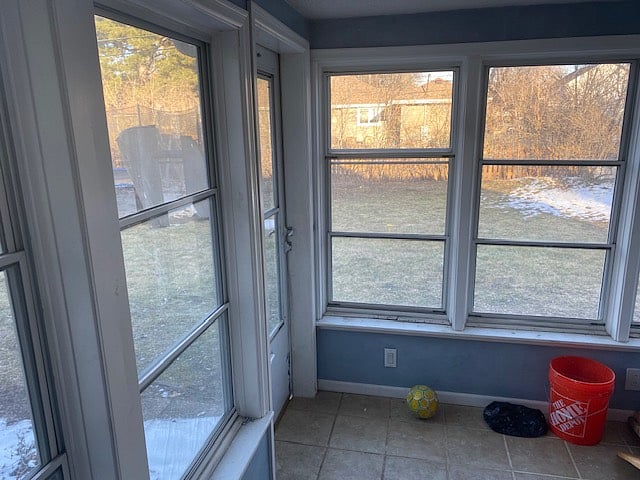 3 season porch to fenced backyard.
