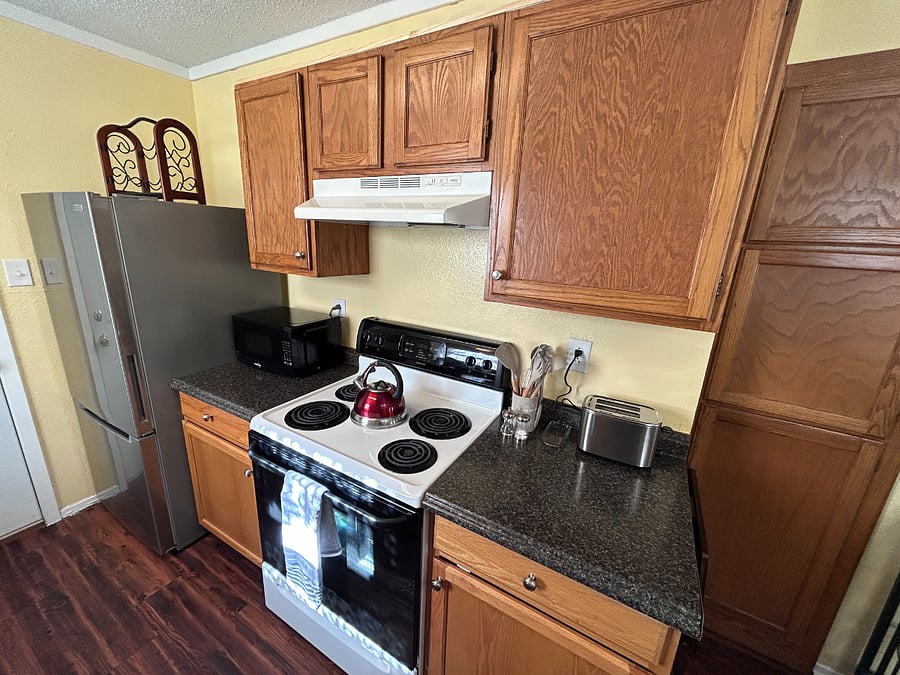 Fridge, Stove/Oven, Microwave and Toaster in Kitchen.  There is also a crockpot under the counter for your use.