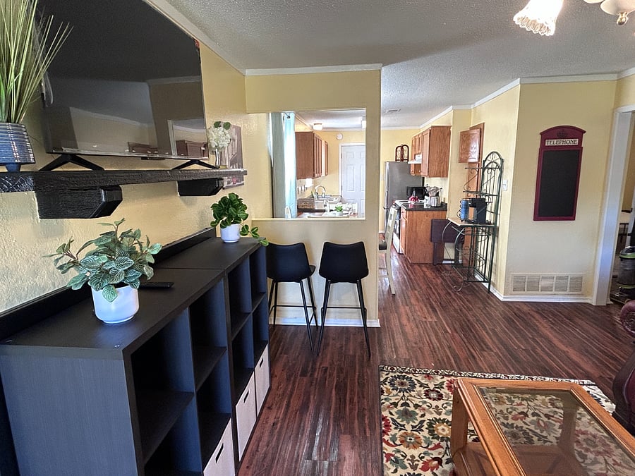 Front door view to Living Room, Dining Area and Kitchen.