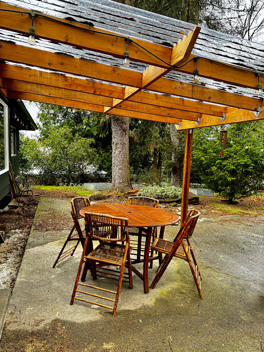 Solid Wood table with 4 bamboo chairs.
