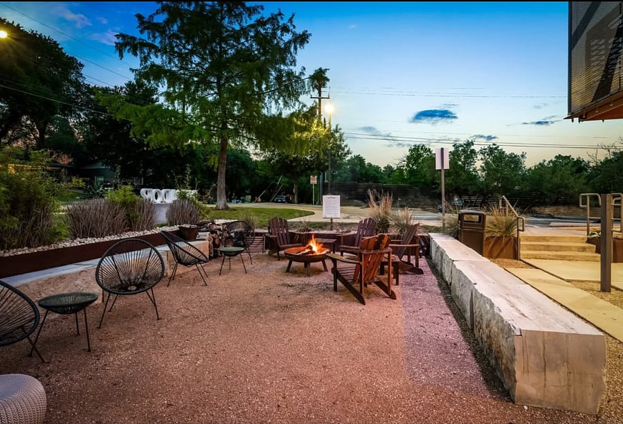 Complex outdoor fire pit and socializing space.