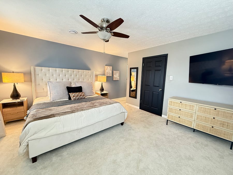 Master bedroom, King size bed on main level.