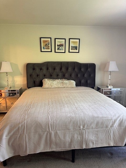 Master 2nd floor bedroom with King bed and en suite bath with soaking tub, shower and walk in closet.  Includes 52" TV