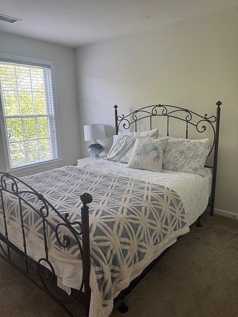 2nd floor bedroom with Queen bed and dresser.