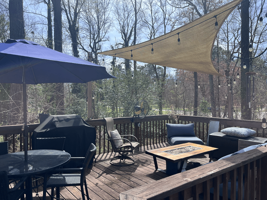 Enjoy the huge deck with comfy seating, shade sail and industrial fan for summer heat and a new grill.