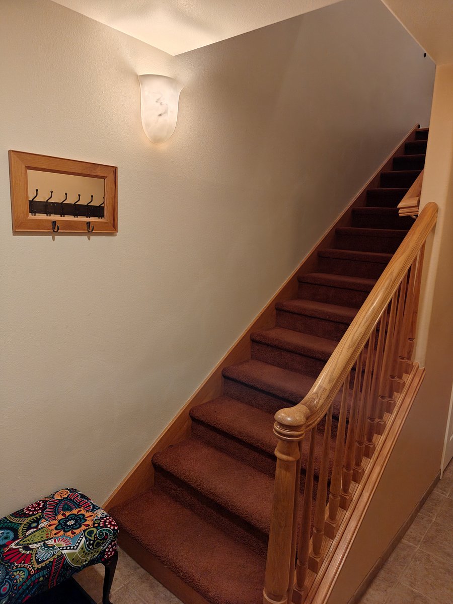 common space stairs from entryway / hallway
