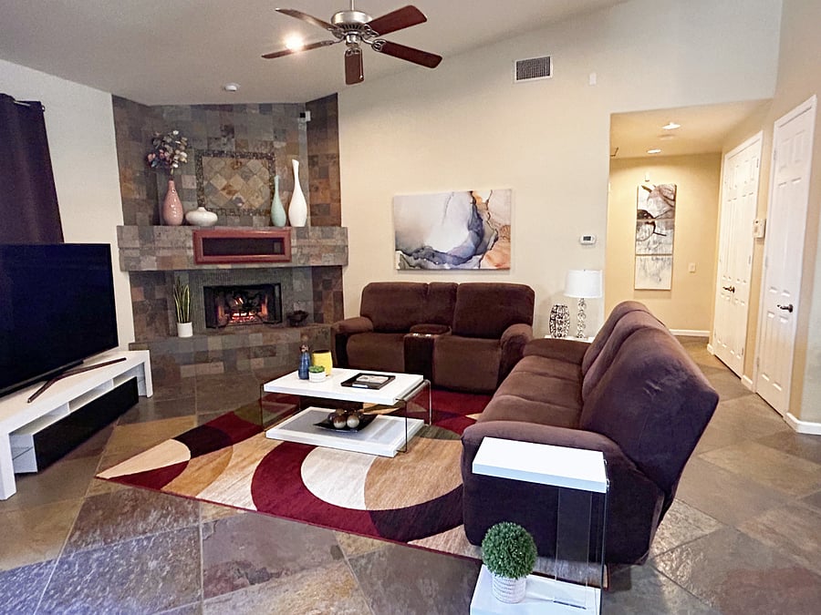 Living Room with Fireplace and 75" Smart TV