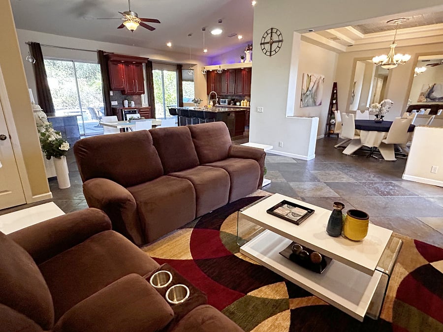 Open Living Area Connecting to Kitchen and Dining