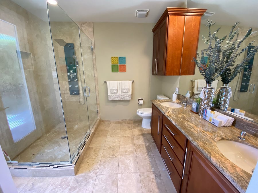 Primary Bathroom with Dual Vanities and Walk-In Shower