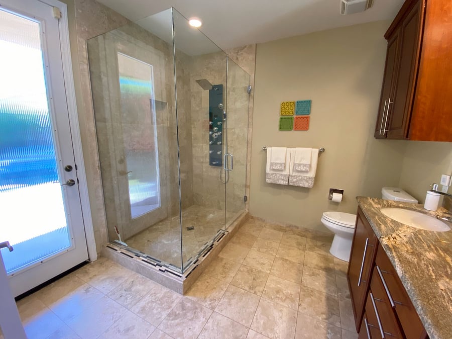 Primary Bathroom with Walk-Out Access to Backyard and Pool