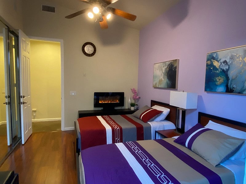 Guest Bedroom with Electric Fireplace