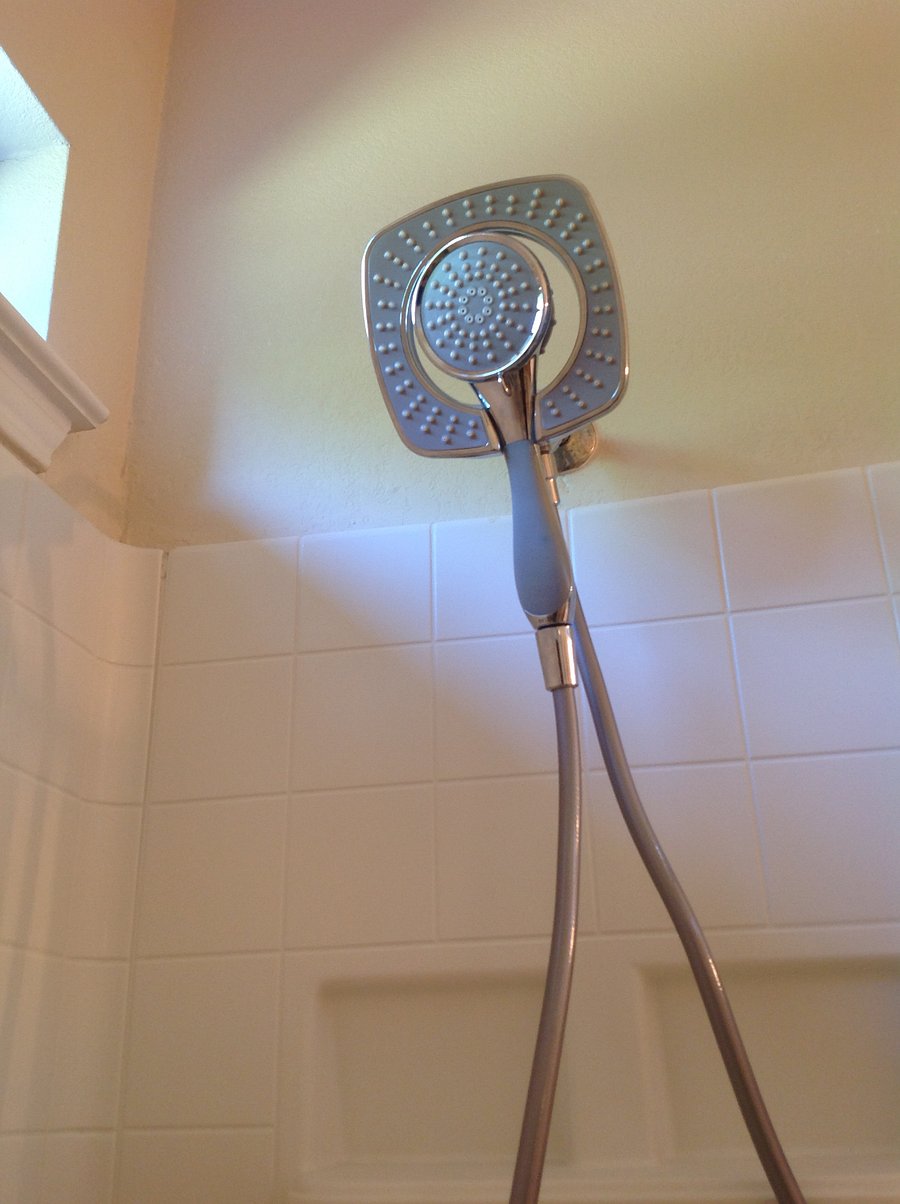 Multiple choices of shower heads with power spray option on back for easy cleaning of tile