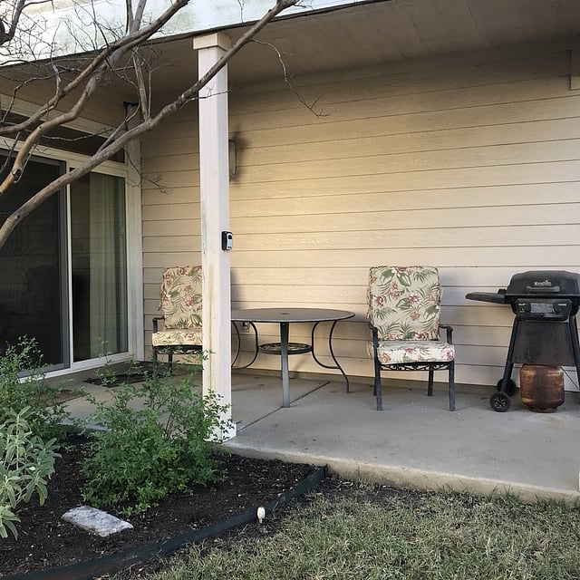 Covered Patio overlooking open spaces along side and back of home