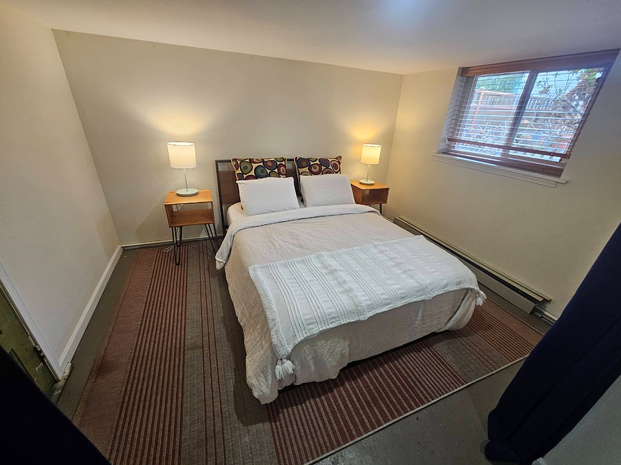 Queen sized bed with walk in closet