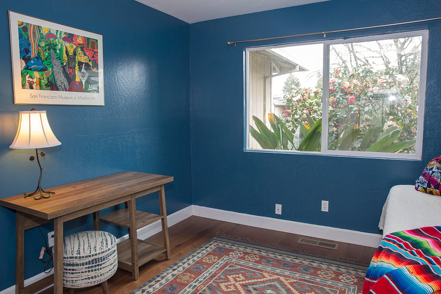 Desk in blue room.