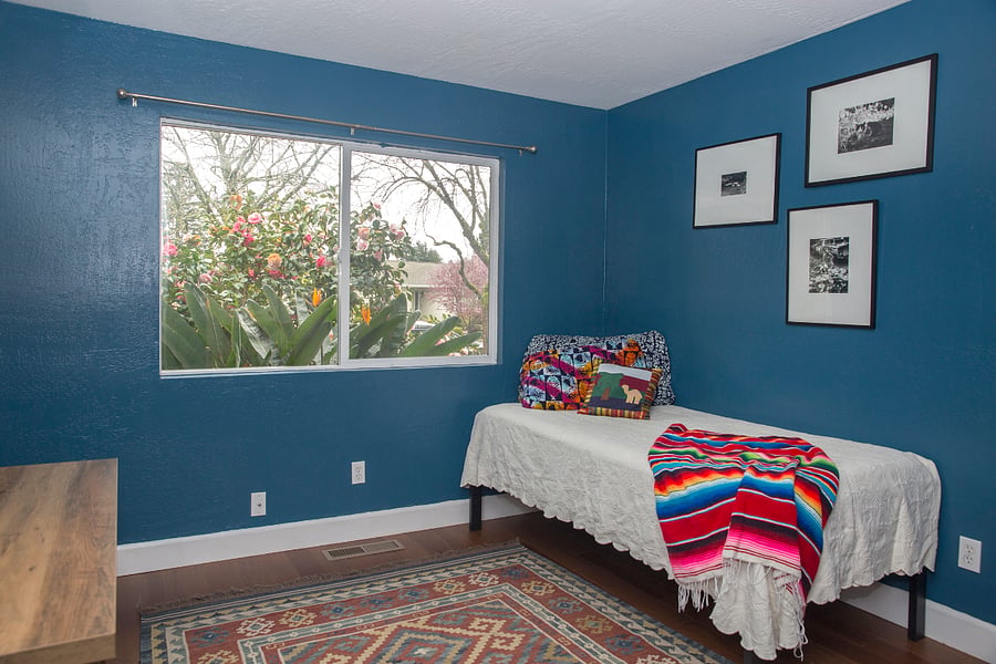 Lounging in blue room.
