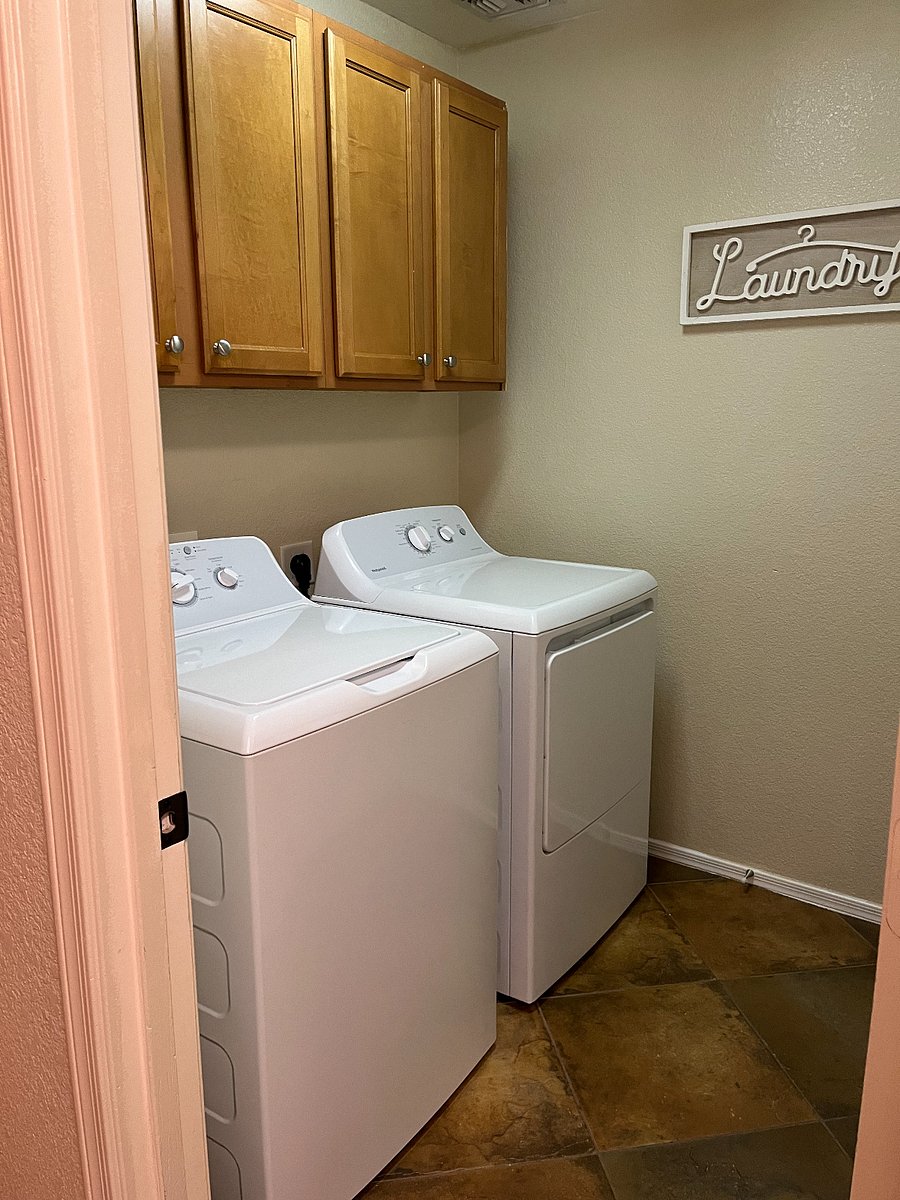 Laundry area - washer and dryer. Included is laundry detergent and fabric softener.