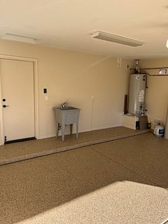 Attached 2 car garage, it is small, but can usually fit a car, two is really tight