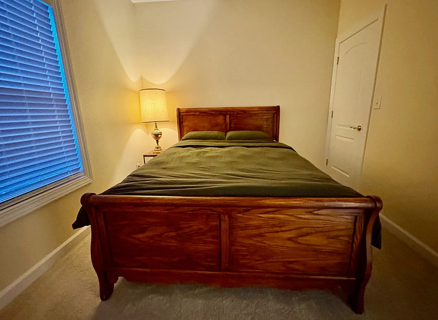 Bedroom 2: Walk-in closet door on the right.