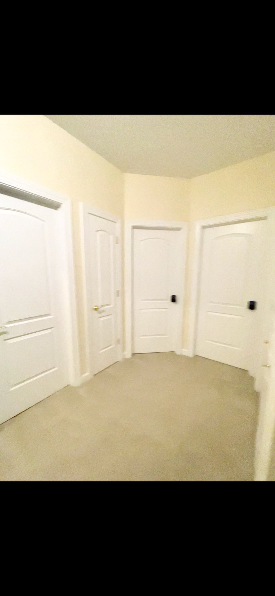 The bedrooms are located on the west side of the house, separated from the common areas by a short hallway for added privacy. From left to right: Bathroom, linen closet, bedroom 1, bedroom 2 and laundry.