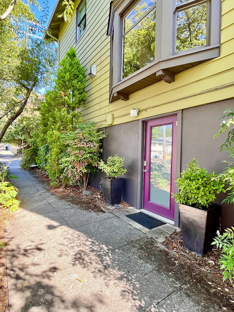 Full light door entrance off sidewalk 