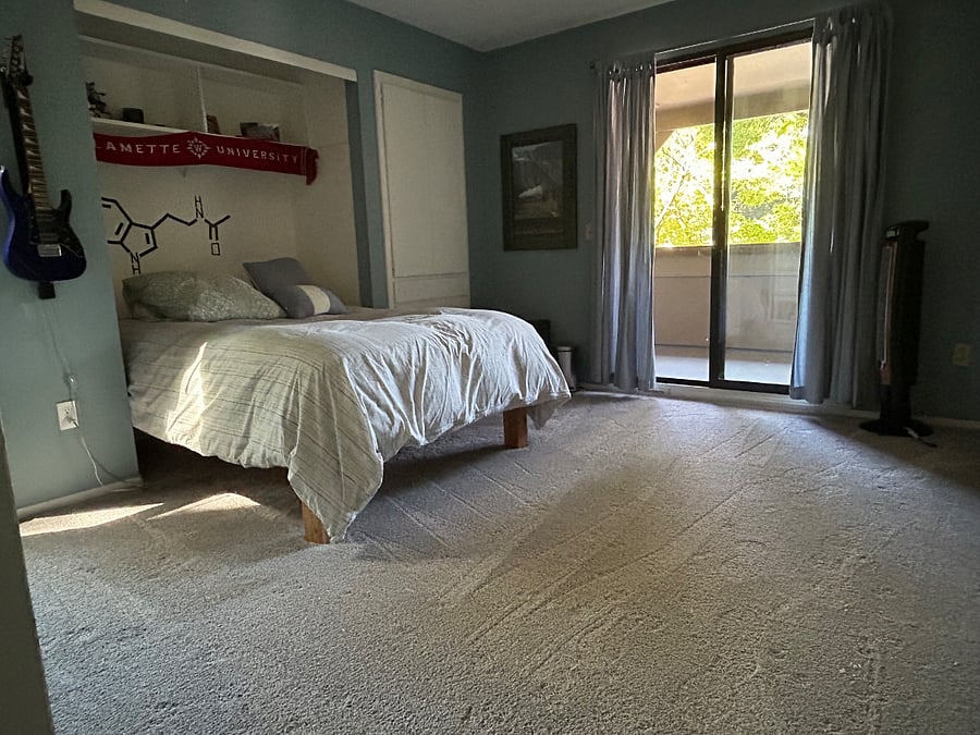 Bedroom with door to balcony