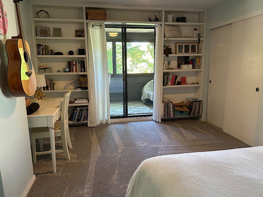 Bedroom with door to balcony