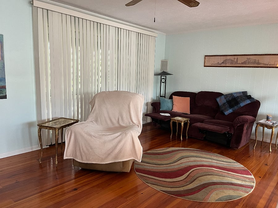 Family room Lazy-boy and couch with recliners
