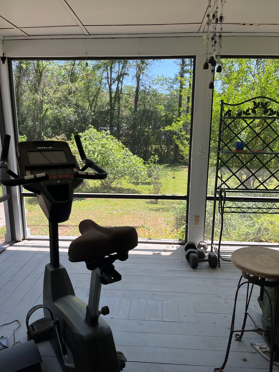 Sunporch with exercise bike and free weights