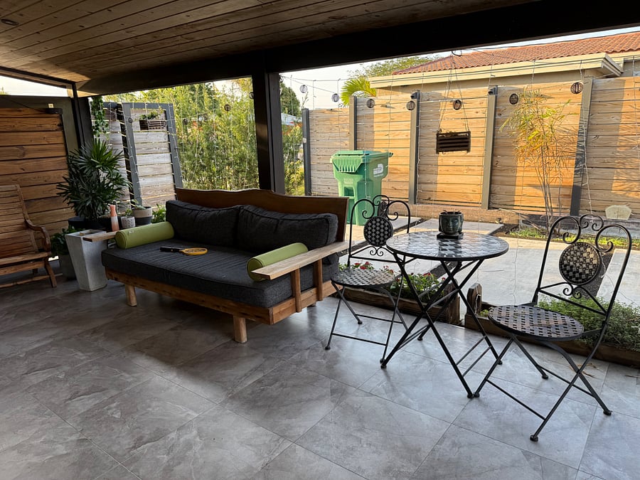 Patio with outdoor teak wood sofa