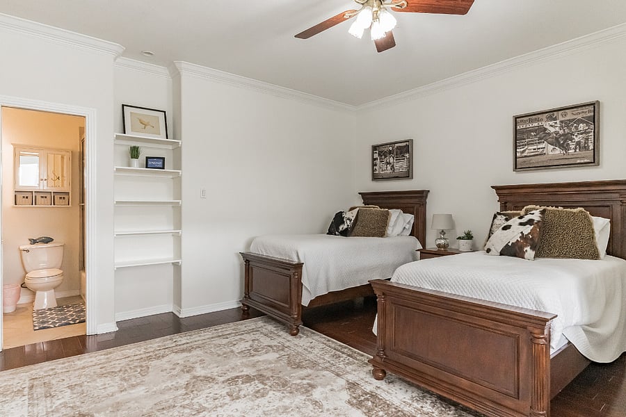 Two twin beds with adjoining bathroom.