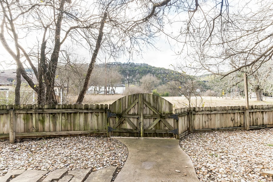 Back yard gate to the park behind the house.