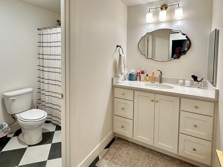 Full bathroom with a partition