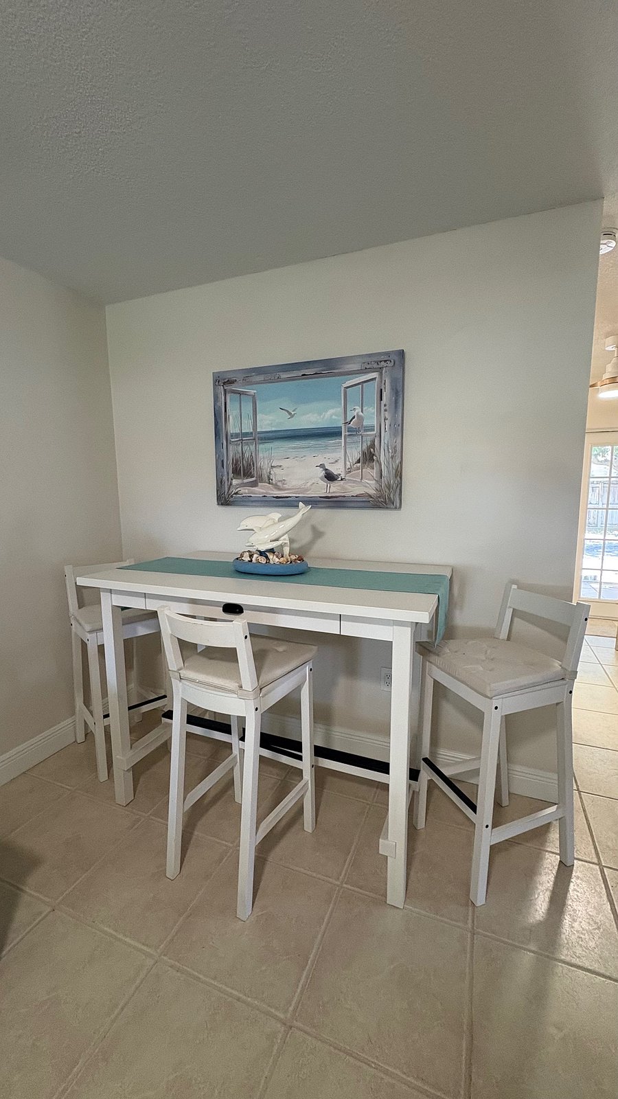 Bar height Dining table or sitting area for games, computer work or watching TV