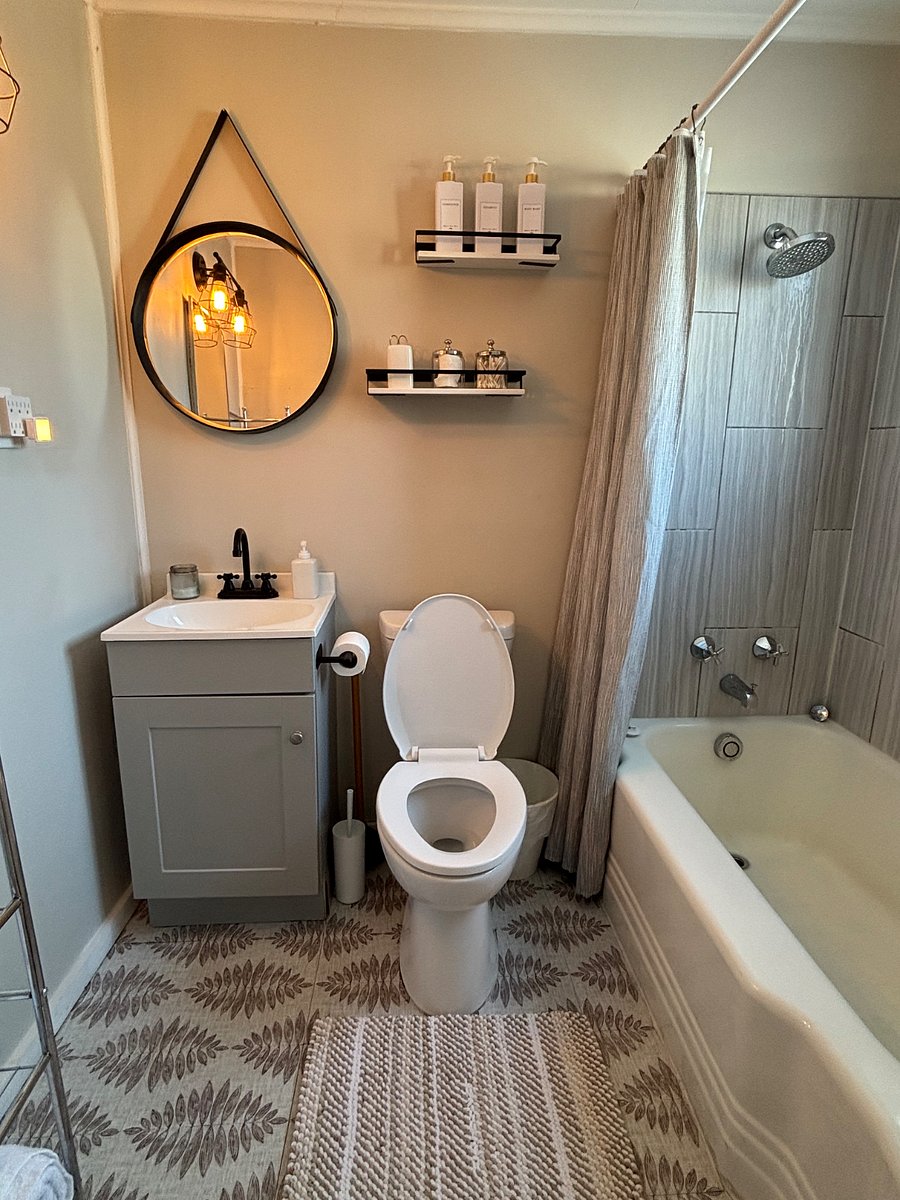 Bathroom, stocked with TP, towels, hand soap, shampoo/conditioner, and body wash